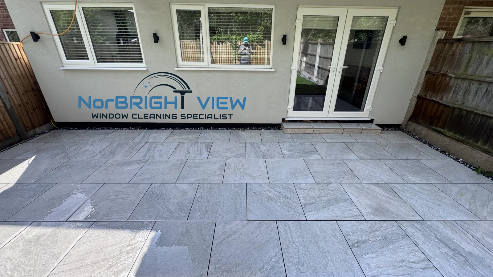 Clean patio paving, photographed while still wet